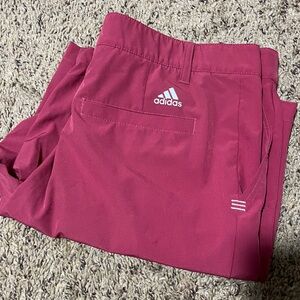 Raspberry adidas golf shorts